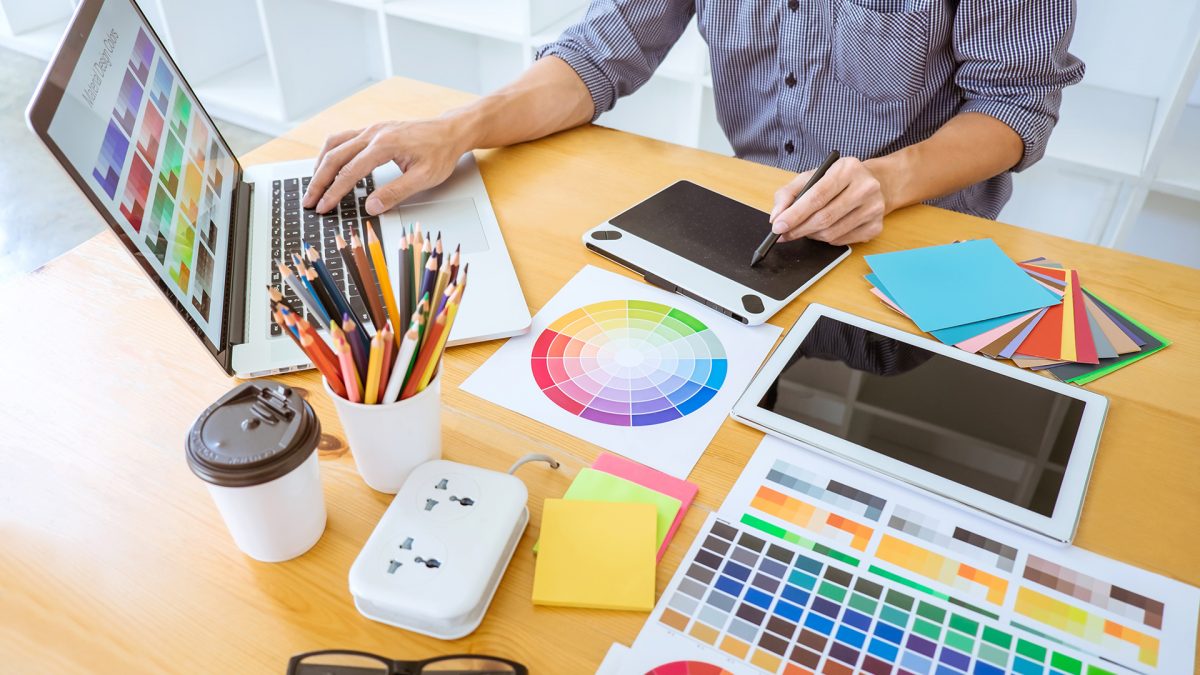 Person Working on Printing Project at a Desk